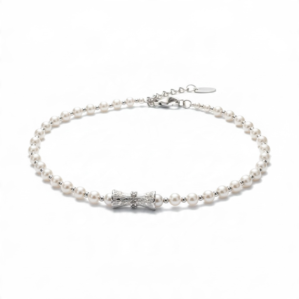 Bracelet Perles Nacrées avec Nœud Argenté