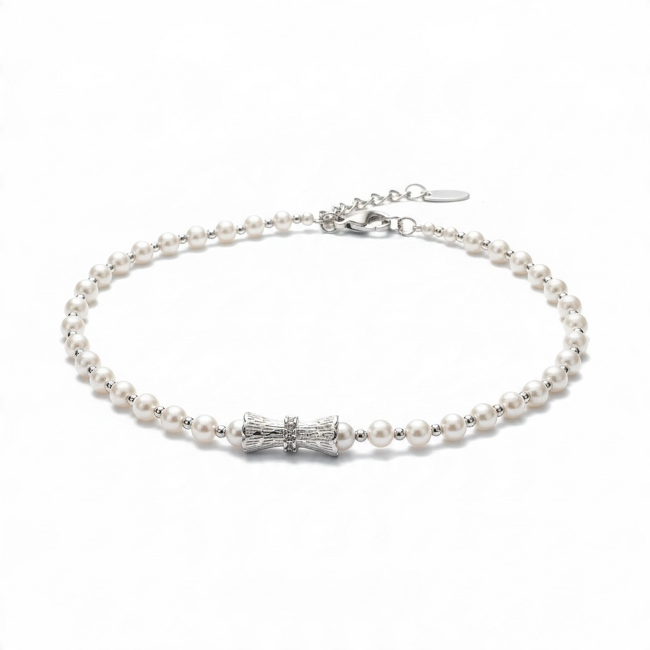 Bracelet Perles Nacrées avec Nœud Argenté