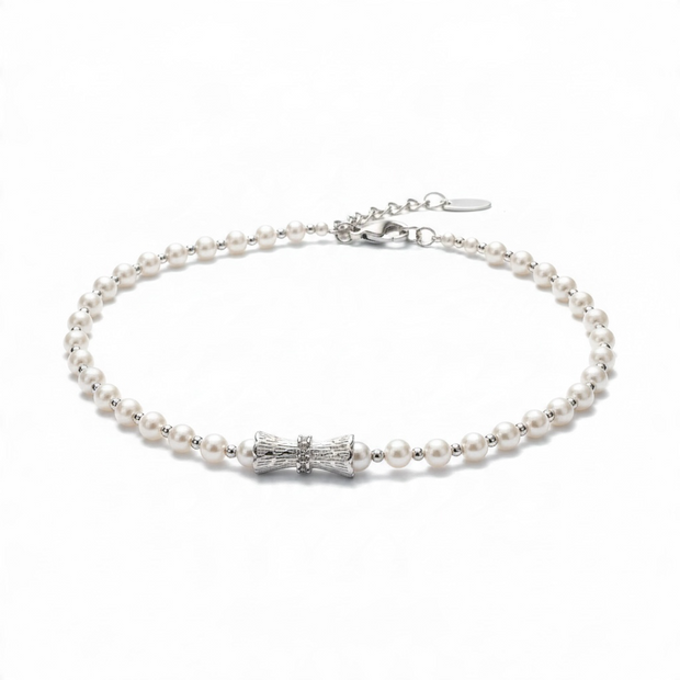 Bracelet Perles Nacrées avec Nœud Argenté
