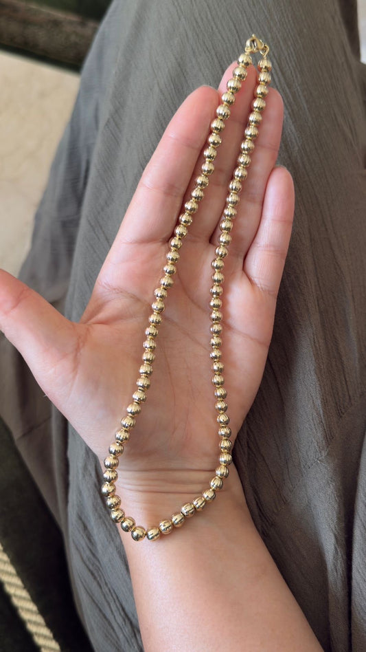 Collier Boules Dorées – Finition XP