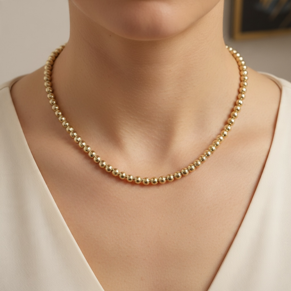 Collier Doré à Perles Boules – Élégance Intemporelle