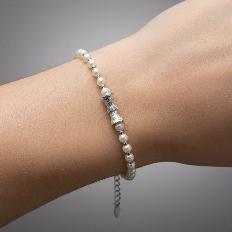 Bracelet Perles Nacrées avec Nœud Argenté