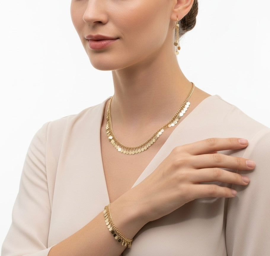 parure élégante dorée -collier,gourmette et boucles