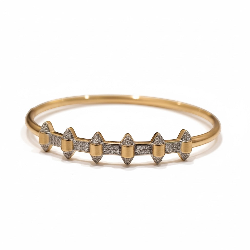 ANIBA JEWELS rose gold bangle bracelet with geometric diamond accents. Modern, delicate, and sophisticated.