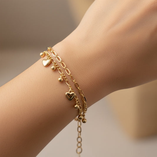 ANIBA JEWELS rose gold double chain bracelet with small dangling hearts and beads. Adjustable.